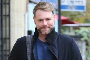 Brian McFadden walking outside ITV's studio in London 