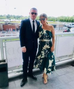 Coleen and Wayne Rooney pose in smart outfits and sunglasses for an Instagram snap