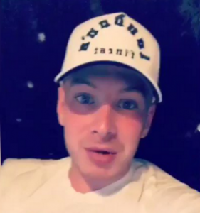 Man wearing a white cap