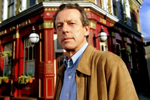 EastEnders character outside pub