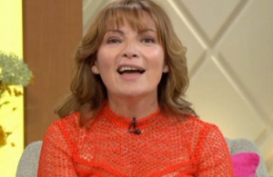 Woman in a red top smiling