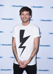 Louis Tomlinson visits the Launch of 'Hits 1 in Hollywood