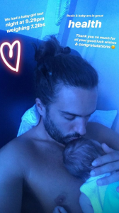 Joe Wicks and his newborn daughter