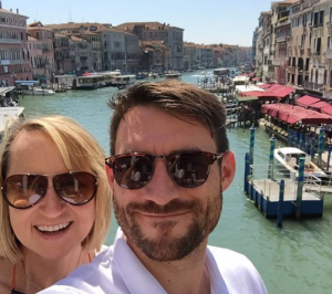Carol and Mark pose on the Rialto Bridge in Venice 