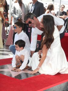 Simon Cowell with partner Lauren silverman and son Eric and her son Adam
