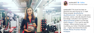 Cath tyldesley poses in the gym with the book that overhauled her eating and fitness regime 