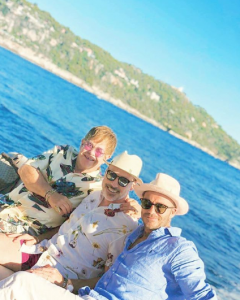 Elton John, his husband David Furnish and David Beckham
