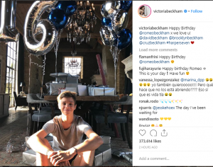Romeo Beckham sits surrounded by balloons and presents on his 16th birthday