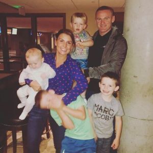Coleen and Wayne Rooney with their children