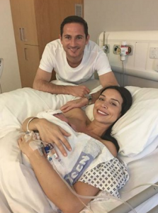 Christine and Frank Lampard smiling in hospital with their newborn baby daughter