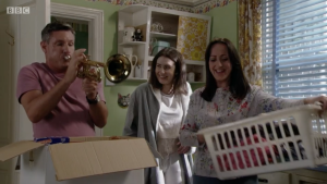 Robbie plays Sonia's trumpet in EastEnders 