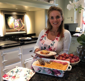 Geri showing off cooking skills