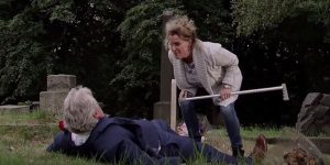 Liz pushes Jim to the ground