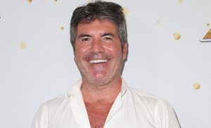 Simon Cowell urges public to help cancer boy 