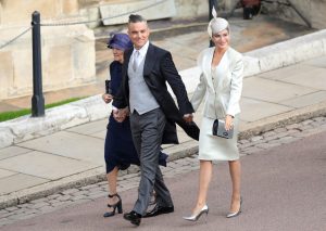 Gwen Field, Robbie Williams and Ayda Field arrive ahead of the wedding of Princess Eugenie of York and Mr. Jack Brooksbank at St. George's Chapel on October 12, 2018 in Windsor, England. (Photo by Aaron Chown - WPA Pool/Getty Images)