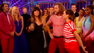 Strictly fans spot Katya's husband Neil glaring as she hugs Seann Walsh after kissing scandal