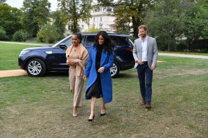 Meghan, Duchess of Sussex (C) arrives with her mother Doria Ragland (L) and Prince Harry, Duke of Sussex to host an event to mark the launch of a cookbook with recipes from a group of women affected by the Grenfell Tower fire at Kensington Palace on September 20, 2018 in London, England. (Photo by Ben Stansall - WPA Pool/Getty Images)