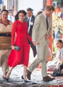Prince Harry, Duke of Sussex and Meghan, Duchess of Sussex arrive at Fua'amotu Airport