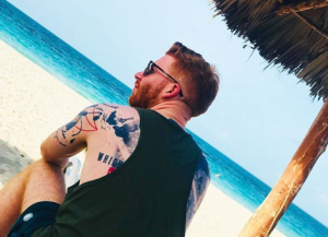 Neil Jones relaxes on a beach in Cuba 
