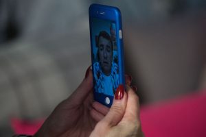 Kat gets a video call from Alfie (Credit: BBC)