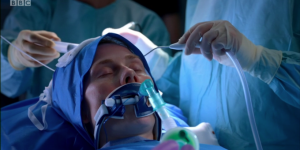 Jac Naylor operating table theatre Holby City