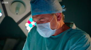Guy Self returns to Holby to operate on Jac Naylor