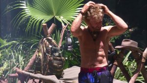 Noel strips off in camp