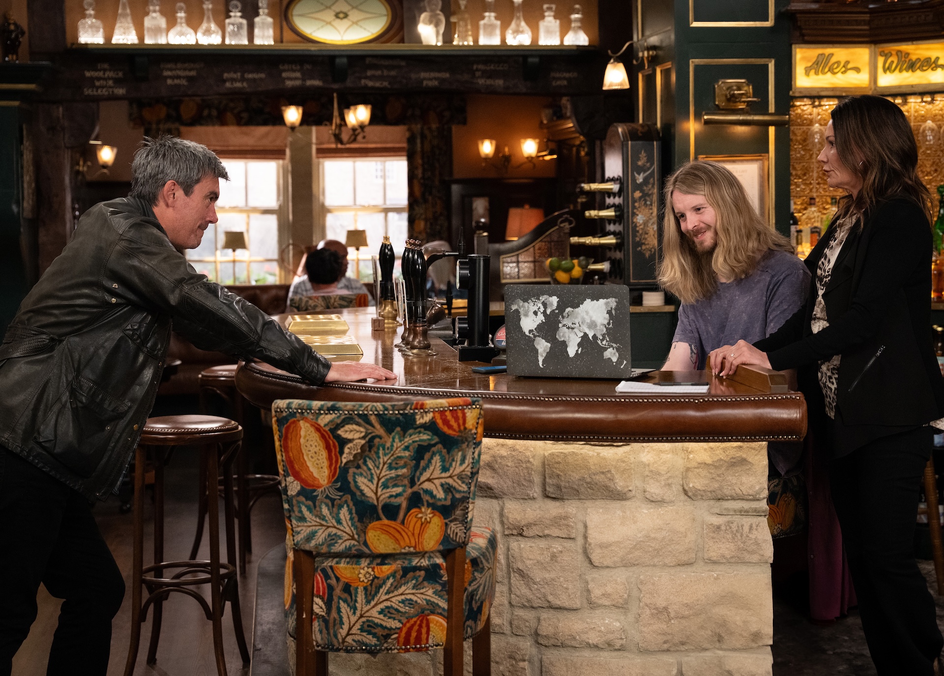 Cain, Ryan and Chas talking in the Woolpack