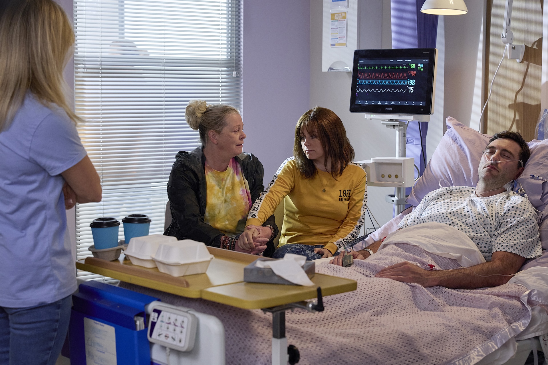 Bernie and Gemma at Kit's hospital bedside 