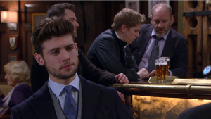 Joe Tate looks smug in the Woolpack on Emmerdale