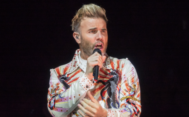 Gary Barlow performing (Credit: Fameflynet)