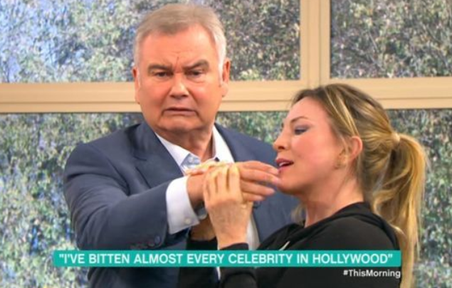 Eamonn Holmes being bit on This Morning