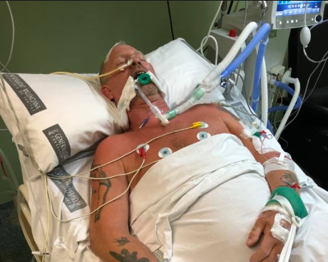 jimmy Carol in hospital following attack, picture shared on Facebook y his son (Credit: Facebook)