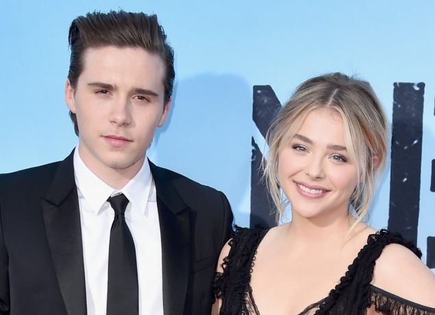 Brooklyn Beckham (L) and actress Chloe Grace Moretz attend the premiere of Universal Pictures' 'Neighbors 2: Sorority Rising' at the Regency Village Theatre