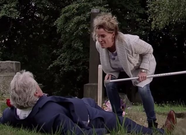 Liz pushes Jim to the ground