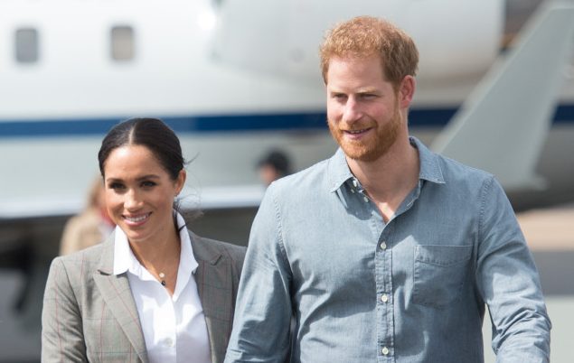 Prince Harry, the Duke of Sussex and Meghan, the Duchess of Sussex arrive at Dubbo Airport
