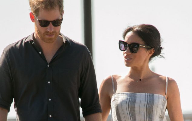Meghan, Duchess of Sussex and Prince Harry, Duke of Sussex walk along Kingfisher Bay Jetty during a visit to Fraser Island on October 22, 2018 on Fraser Island, Australia. The Duke and Duchess of Sussex are on their official 16-day Autumn tour visiting cities in Australia, Fiji, Tonga and New Zealand. (Photo by Kirsty Wigglesworth - Pool/Getty Images)