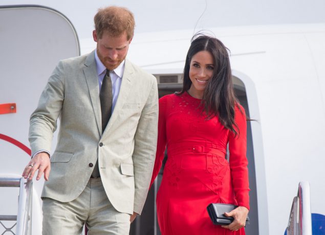 Prince Harry, Duke of Sussex and Meghan, Duchess of Sussex arrive at Fua'amotu Airport