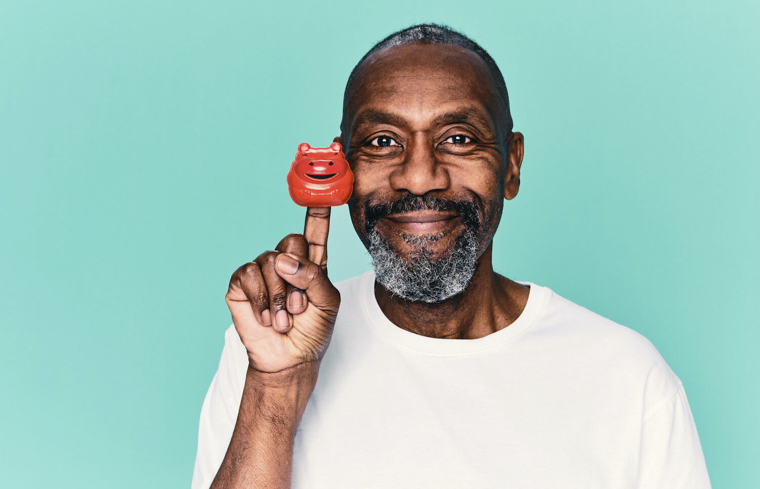 Lenny Henry posing with a red nose for Comic Relief 2022