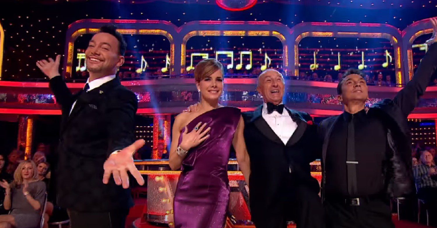 Len Goodman smiling with Strictly judges 
