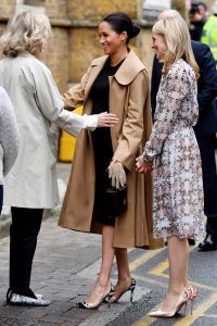 Meghan shows off her baby bump