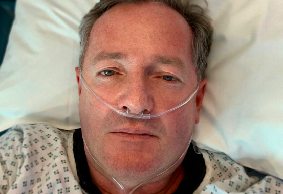 Piers Morgan hospital bed