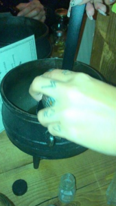 Jesy mixes some cocktails