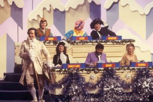 Windsor Davies (top right) appearing in pantomime costume on the Christmas edition of Blankety Blank in 1980 (PA)