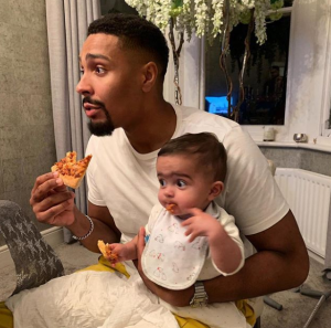 Jordan Banjo with his son