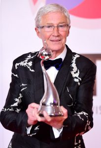 Paul O’Grady with the award for best factual entertainment (Ian West/PA)