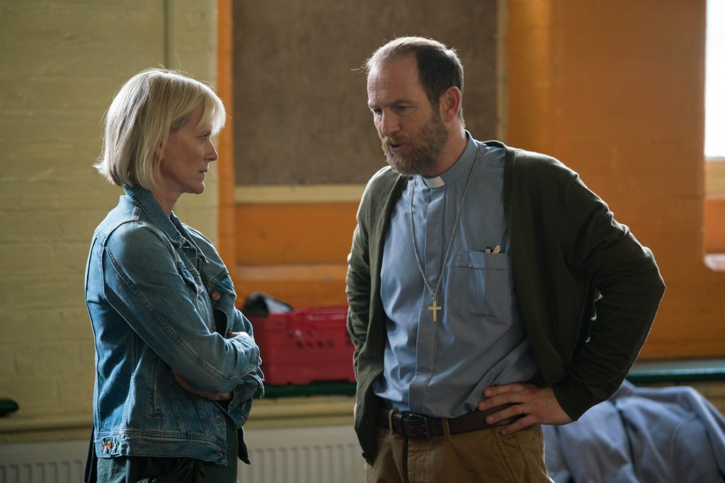 This image is strictly embargoed until 00.01 Tuesday 5th February 2019 From Big Talk Productions Cold Feet: SR8: Ep5 on ITV Pictured: Karen [Hermione Norris] and Rev. Daniel Booth [Paul Kaye]. This photograph is (C) Big Talk and can only be reproduced for editorial purposes directly in connection with the programme or event mentioned above, or ITV plc. Once made available by ITV plc Picture Desk, this photograph can be reproduced once only up until the transmission [TX] date and no reproduction fee will be charged. Any subsequent usage may incur a fee. This photograph must not be manipulated [excluding basic cropping] in a manner which alters the visual appearance of the person photographed deemed detrimental or inappropriate by ITV plc Picture Desk. This photograph must not be syndicated to any other company, publication or website, or permanently archived, without the express written permission of ITV Picture Desk. Full Terms and conditions are available on the website www.itv.com/presscentre/itvpictures/terms For further information please contact: james.hilder@itv.com / 0207 157 3052