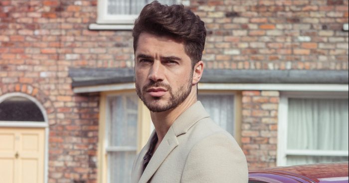 FROM ITV STRICT EMBARGO Tuesday 8 November 2016 Coronation Street - Ep 9035 Wednesday 16 November 2016 A flashy new Jaguar sweeps onto Coronation Street and parks outside Underworld. Adam Barlow [SAM ROBERTSON] steps out Picture contact: david.crook@itv.com on 0161 952 6214 Photographer - Mark Bruce This photograph is (C) ITV Plc and can only be reproduced for editorial purposes directly in connection with the programme or event mentioned above, or ITV plc. Once made available by ITV plc Picture Desk, this photograph can be reproduced once only up until the transmission [TX] date and no reproduction fee will be charged. Any subsequent usage may incur a fee. This photograph must not be manipulated [excluding basic cropping] in a manner which alters the visual appearance of the person photographed deemed detrimental or inappropriate by ITV plc Picture Desk. This photograph must not be syndicated to any other company, publication or website, or permanently archived, without the