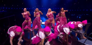 Little Mix on stage at the Brits