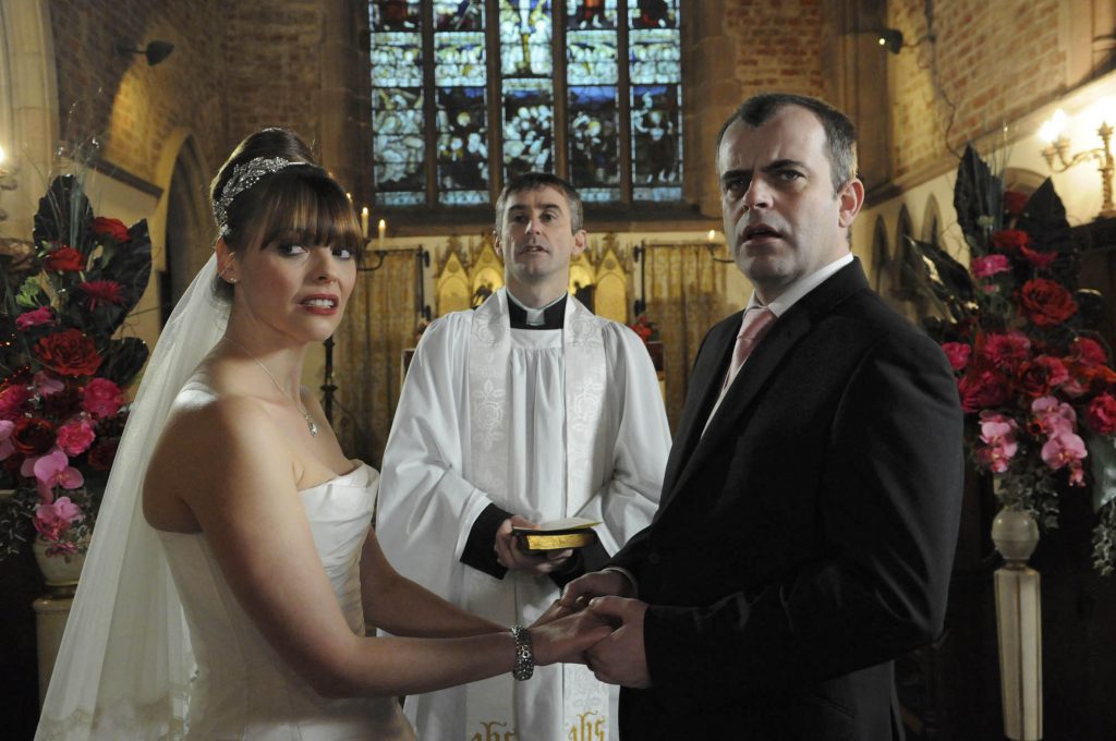 Mandatory Credit: Photo by ITV/REX/Shutterstock (3529622bv) Coronation Street - Ep 7785 Monday 23 January 2012 at 7.30pm At the church both Steve McDonald [SIMON GREGSON] and Tracy Barlow [KATE FORD] are shocked to see Becky McDonald [KATHERINE KELLY] and Kylie there but are prevented from going over as the service begins. The wedding underway Kylie wonders when Becky will drop her bombshell. As the vicar asks if anyone knows of any lawful impediment Becky stands up. Is this her moment for revenge? Coronation Street 2012
